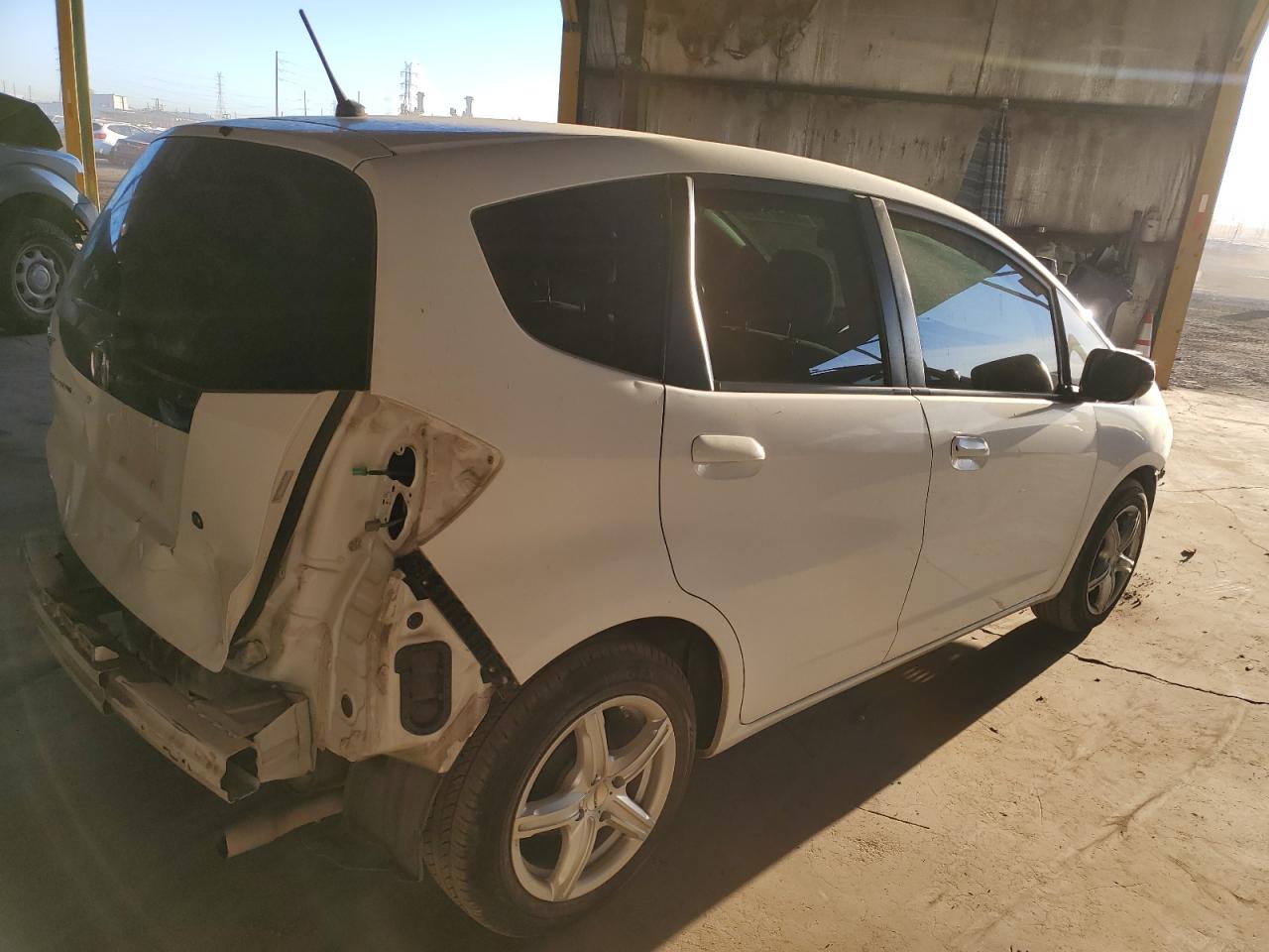 2009 Honda Fit VIN JHMGE882X9S073025 Copart auction photo, front end / rear end damage thumbnail 3