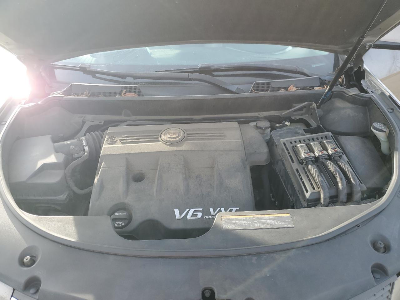 2012 Cadillac SRX VIN 3GYFNAE37CS632425 Copart auction photo, front end damage thumbnail 12