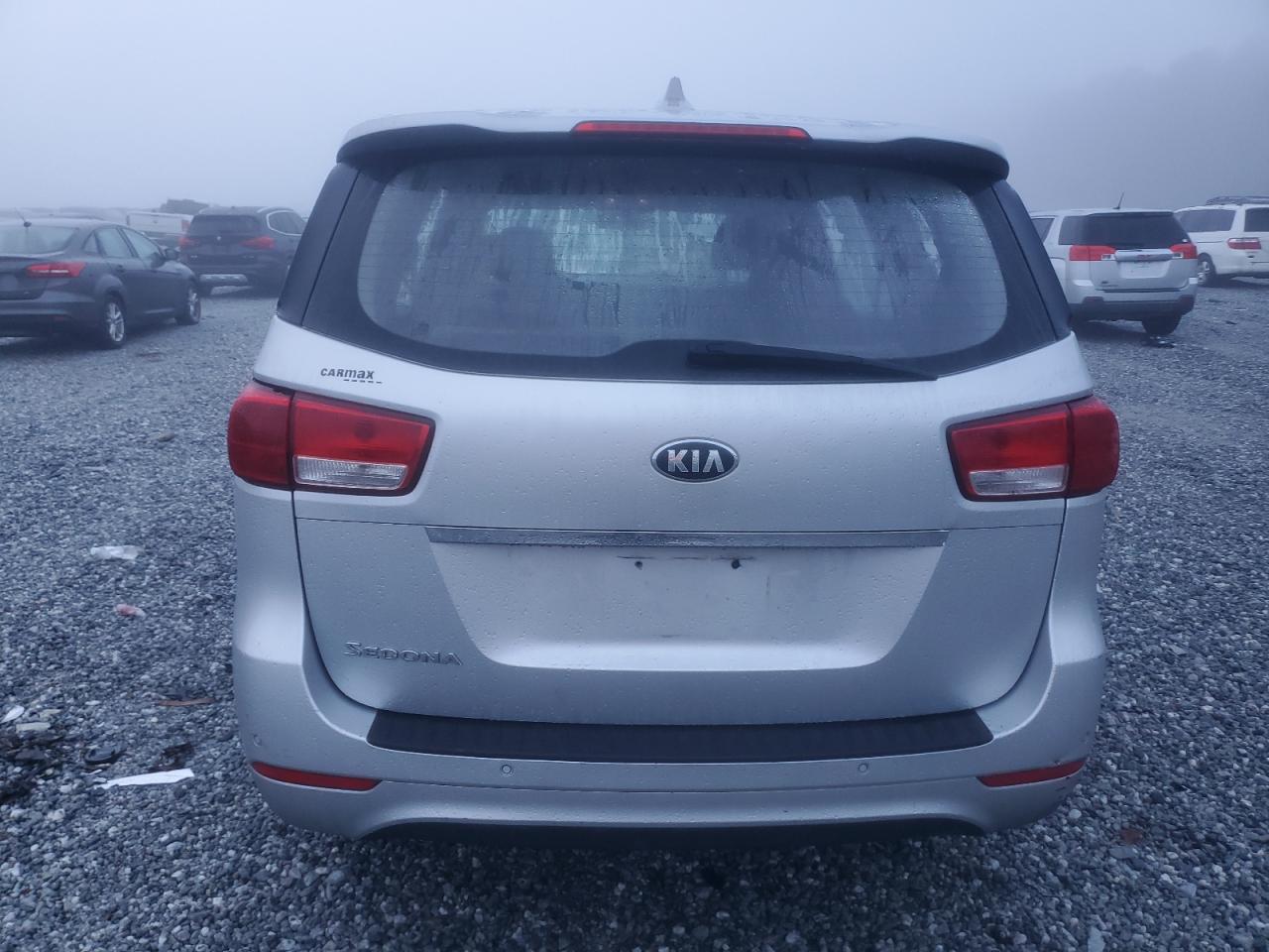 2015 KIA Sedona VIN KNDMA5C11F6024944 Copart auction photo, front end damage thumbnail 6