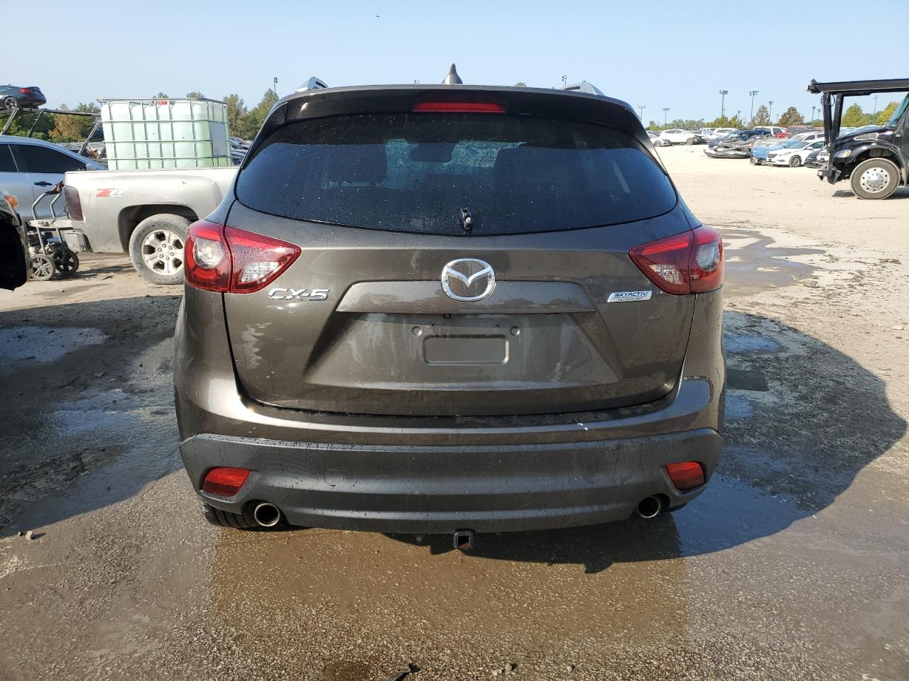 2016 Mazda CX-5 VIN JM3KE2DY5G0608412 Copart auction photo, front end / side damage thumbnail 6