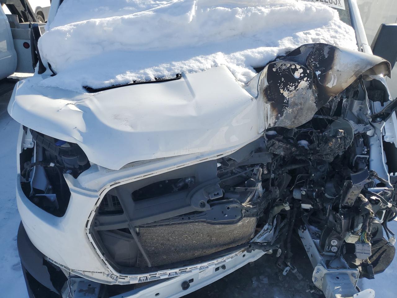 2022 Ford Transit VIN 1FTBW3X84NKA83206 Copart auction photo, front end / burn - engine damage thumbnail 14