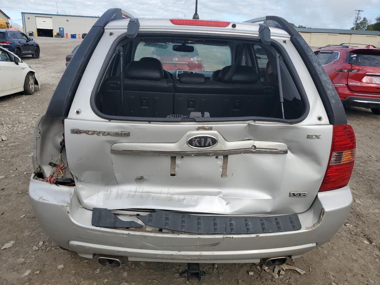 2007 KIA Sportage VIN KNDJF723477300211 Copart auction photo, rear end / minor dent/scratches damage thumbnail 6