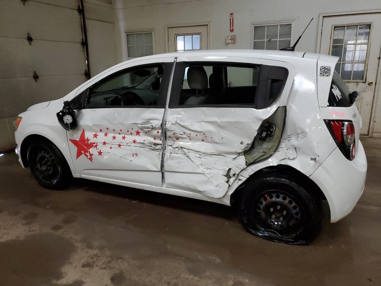 2014 Chevrolet Sonic VIN 1G1JA6SH1E4139344 Copart auction photo, side / rear end damage thumbnail 2