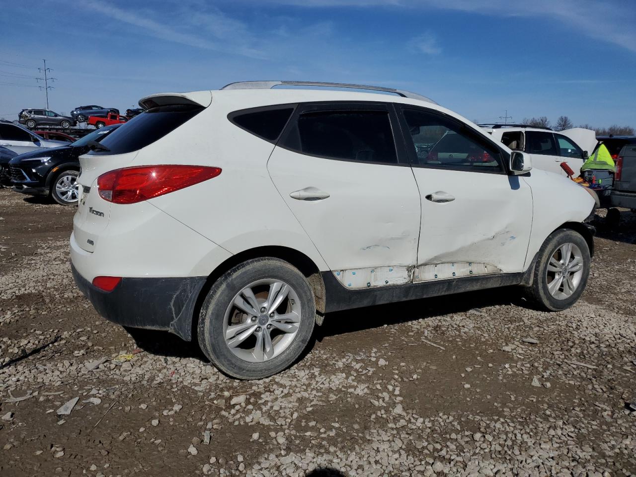 2010 Hyundai Tucson VIN KM8JUCAC2AU057275 Copart auction photo, all over damage thumbnail 3