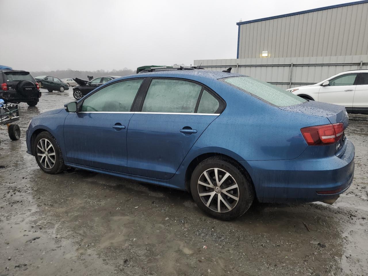 2017 Volkswagen Jetta VIN 3VWDB7AJ6HM386487 Copart auction photo, minor dent/scratches damage thumbnail 2