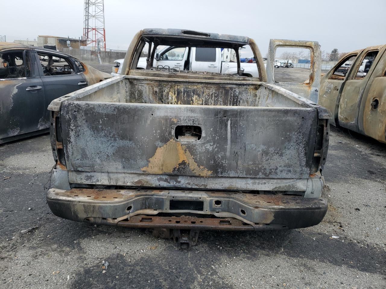 2006 GMC Sierra VIN 1GTEC19T46Z118623 Copart auction photo, burn damage thumbnail 6