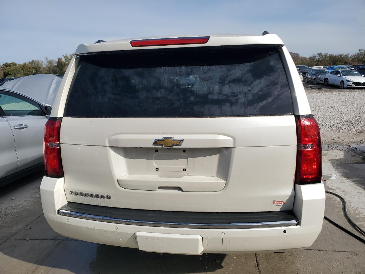 2015 Chevrolet Suburban VIN 1GNSKKKC5FR309853 Copart auction photo, side damage thumbnail 6