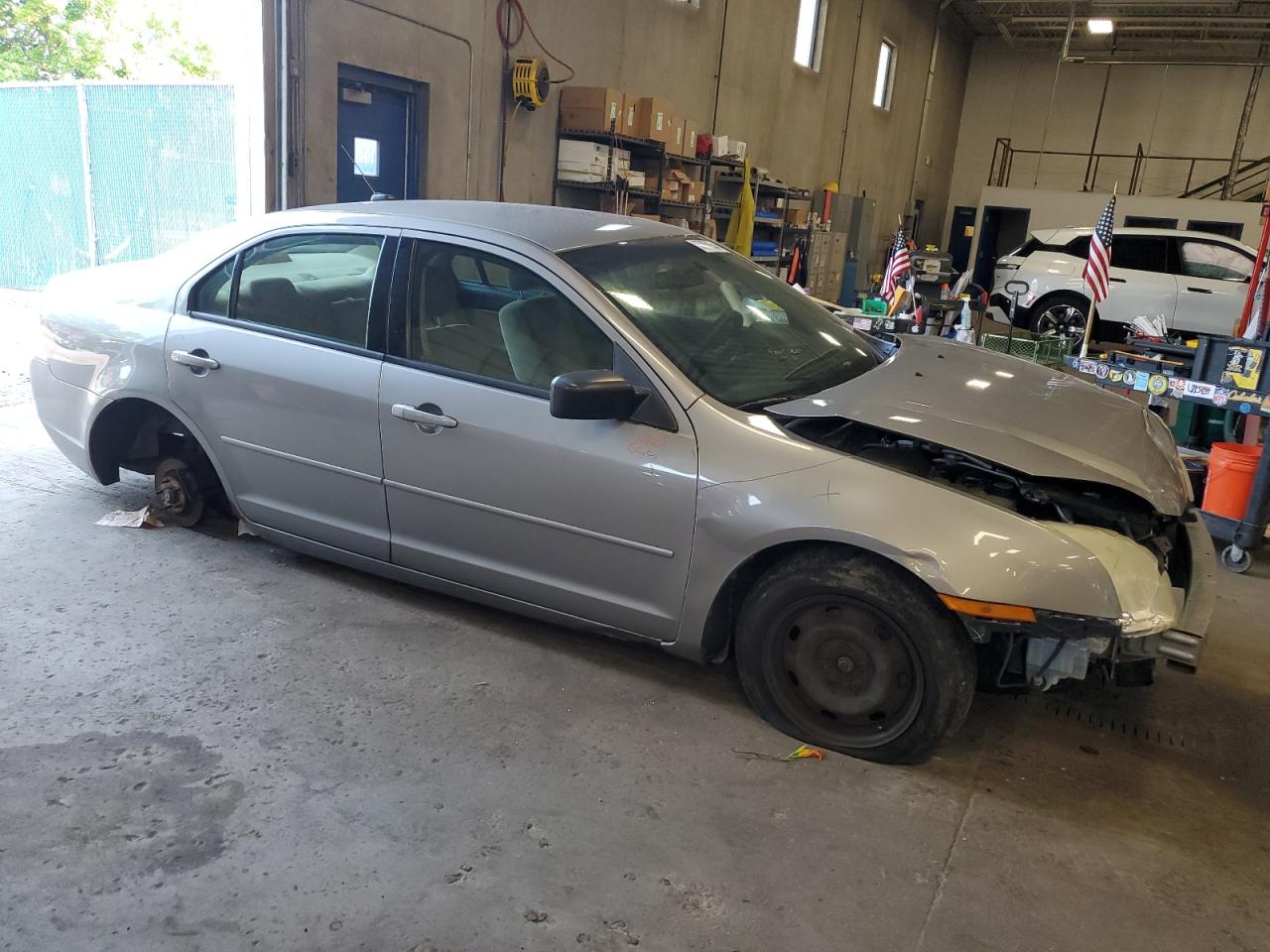 2008 Ford Fusion VIN 3FAHP06Z08R186029 Copart auction photo, front end / side damage thumbnail 4
