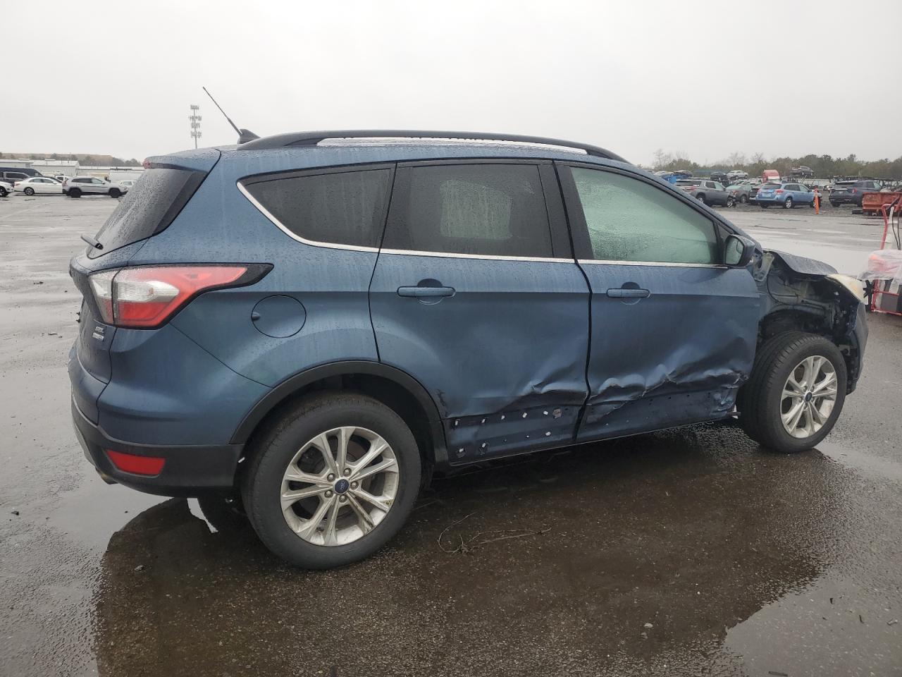 2018 Ford Escape VIN 1FMCU9HD8JUB50733 Copart auction photo, side / front end damage thumbnail 3