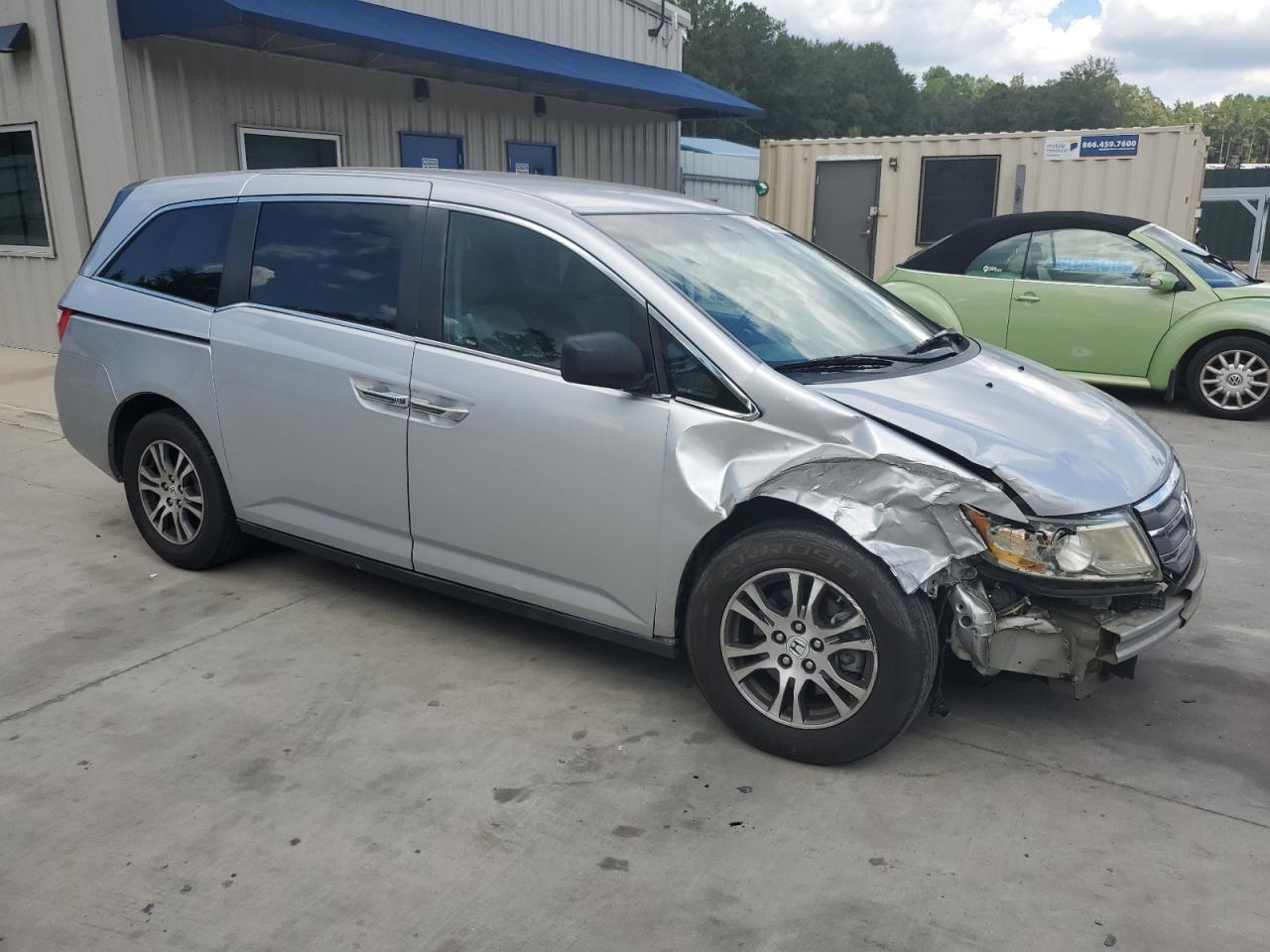 2011 Honda Odyssey VIN 5FNRL5H40BB041865 Copart auction photo, front end / undercarriage damage thumbnail 4