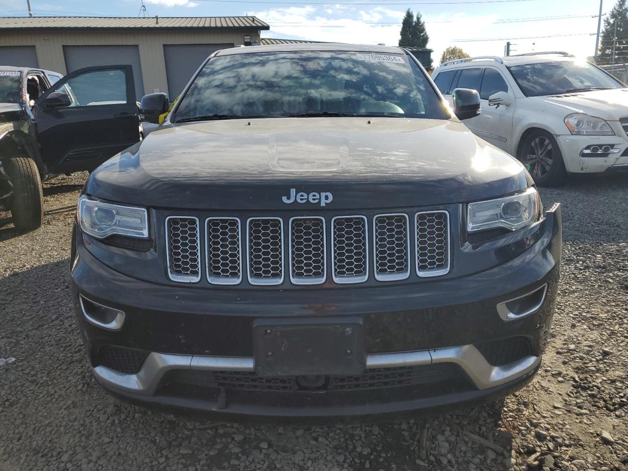 2015 Jeep Grand Cherokee VIN 1C4RJFJM8FC103117 Copart auction photo, all over damage thumbnail 5