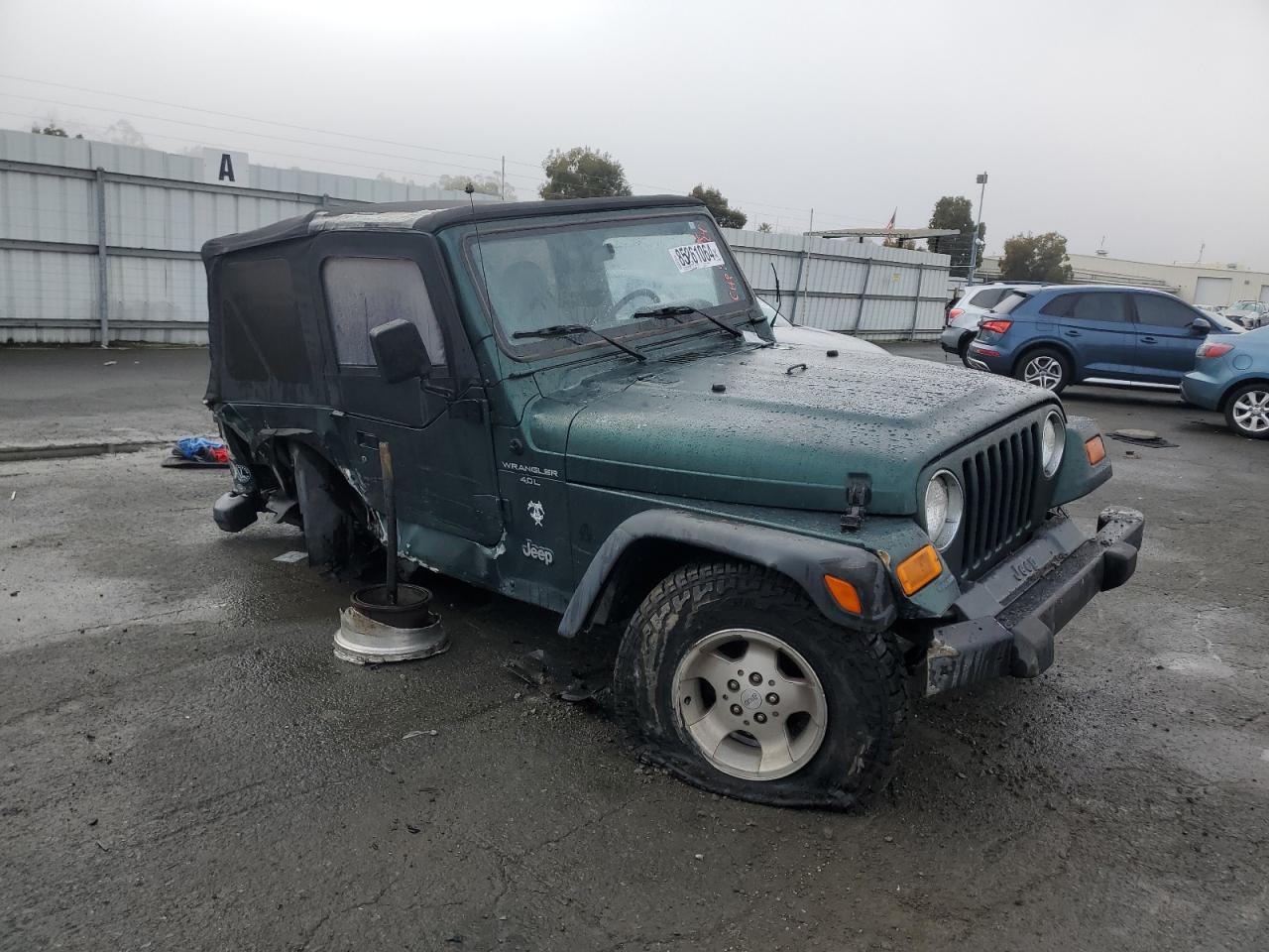 1999 Jeep Wrangler VIN 1J4FY19S7XP487349 Copart auction photo, all over damage thumbnail 4