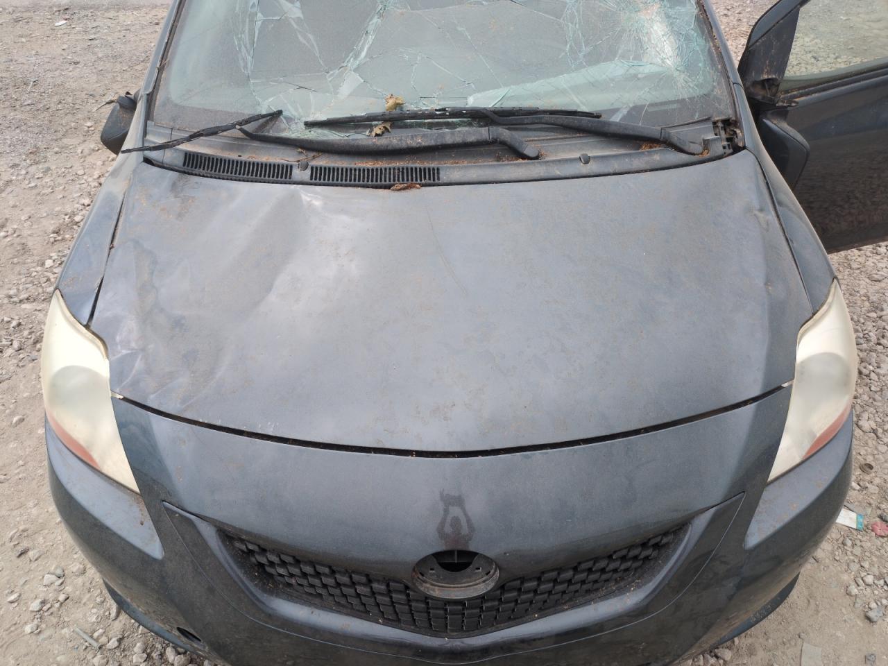 2009 Toyota Yaris VIN JTDBT903091330887 Copart auction photo, top/roof damage thumbnail 12