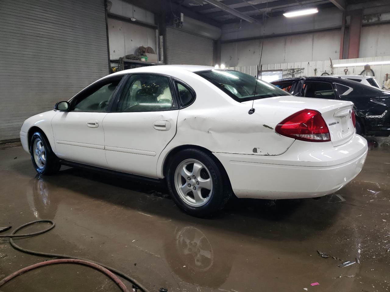 2006 Ford Taurus VIN 1FAFP53U16A233055 Copart auction photo, side / rear end damage thumbnail 2