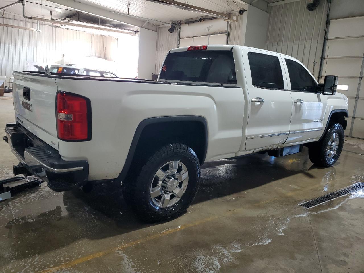 2015 GMC Sierra VIN 1GT423E83FF501983 Copart auction photo, front end / side damage thumbnail 3