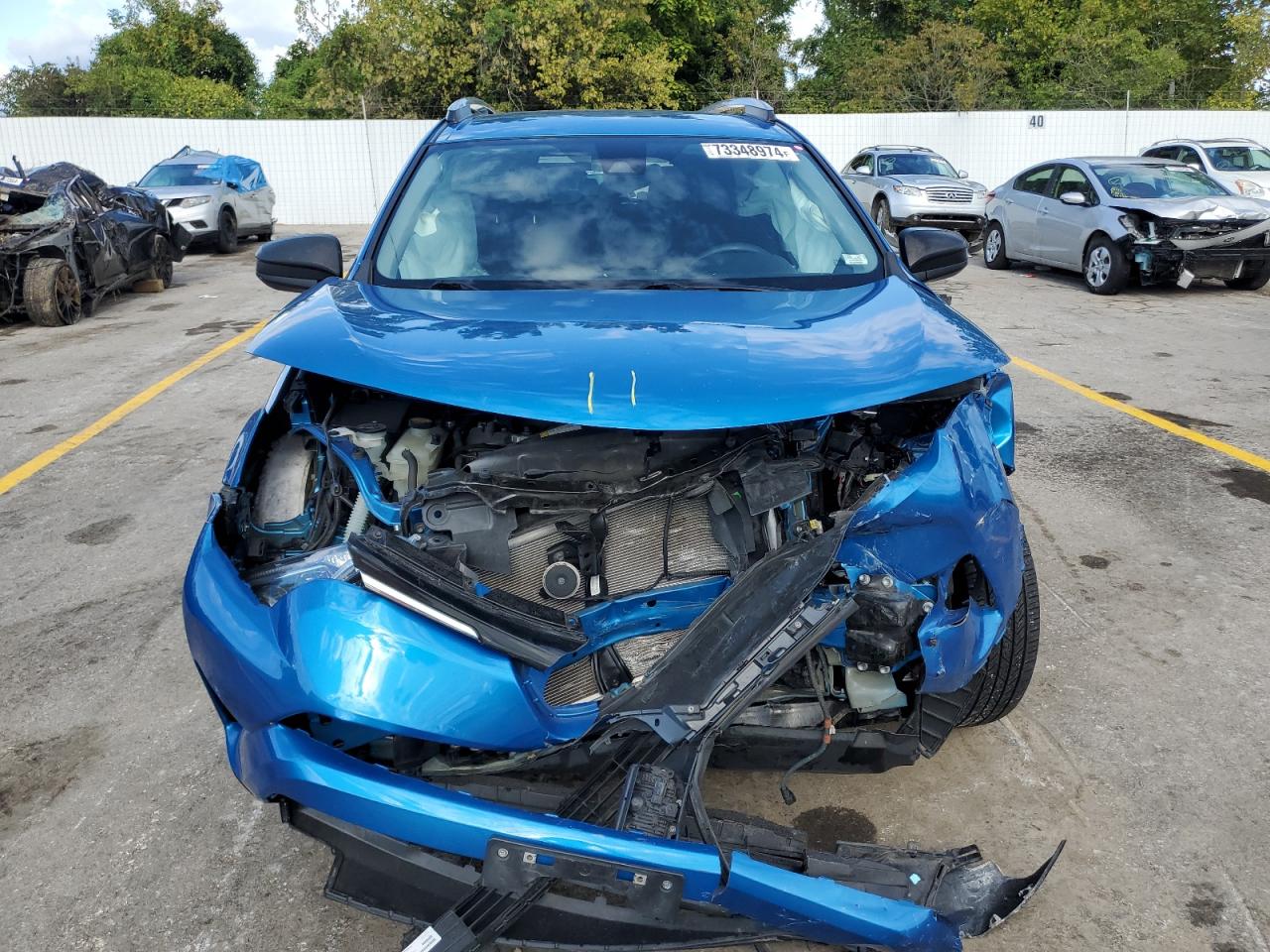 2018 Toyota RAV 4 VIN 2T3ZFREV9JW473889 Copart auction photo, front end damage thumbnail 5