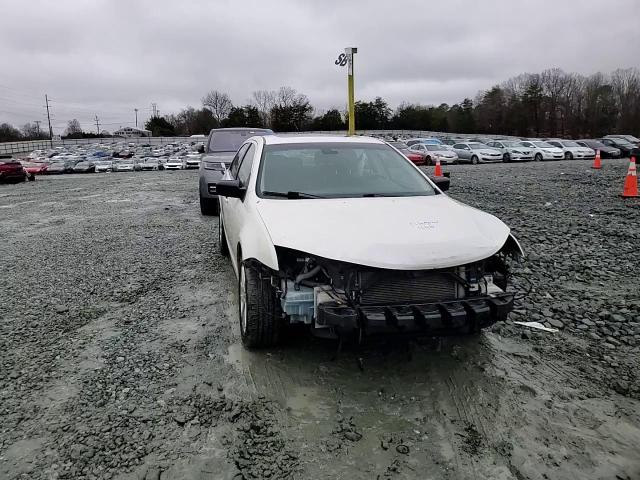 2012 Ford Fusion VIN 3FAHP0JA4CR101140 Copart auction photo, front end / minor dent/scratches damage thumbnail 11
