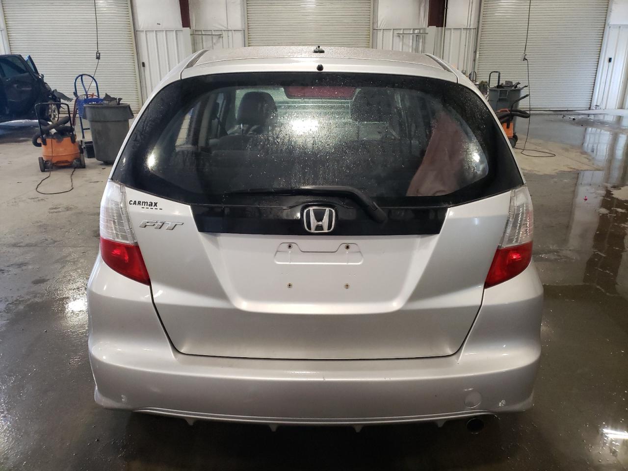 2011 Honda Fit VIN JHMGE8H32BC028203 Copart auction photo, front end / side damage thumbnail 6