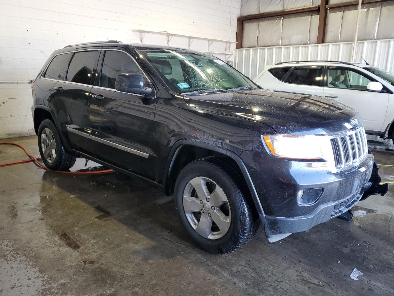 2013 Jeep Grand Cherokee VIN 1C4RJFAG1DC634411 Copart auction photo, front end damage thumbnail 4
