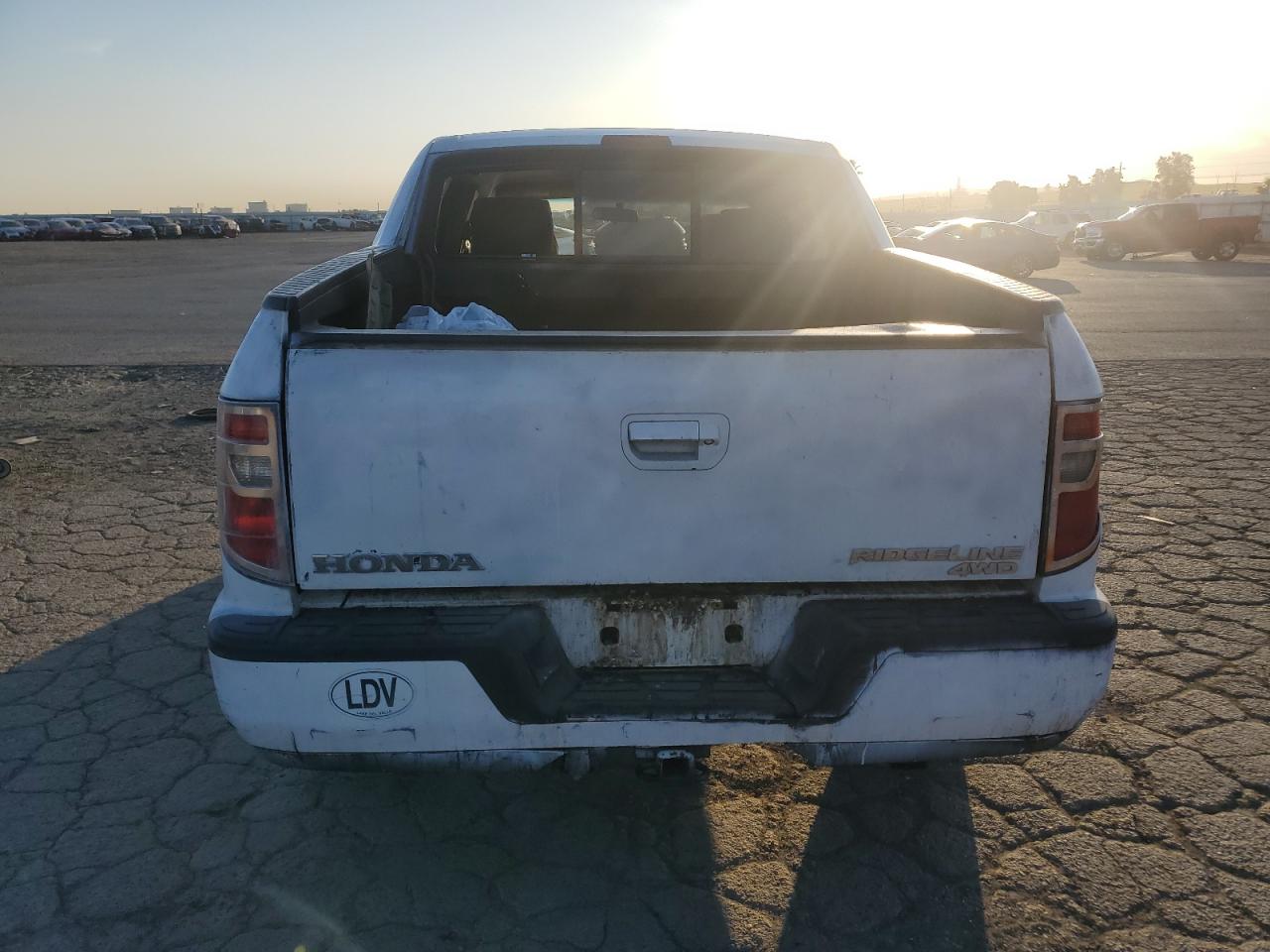 2014 Honda Ridgeline VIN 5FPYK1F74EB003300 Copart auction photo, minor dent/scratches damage thumbnail 6