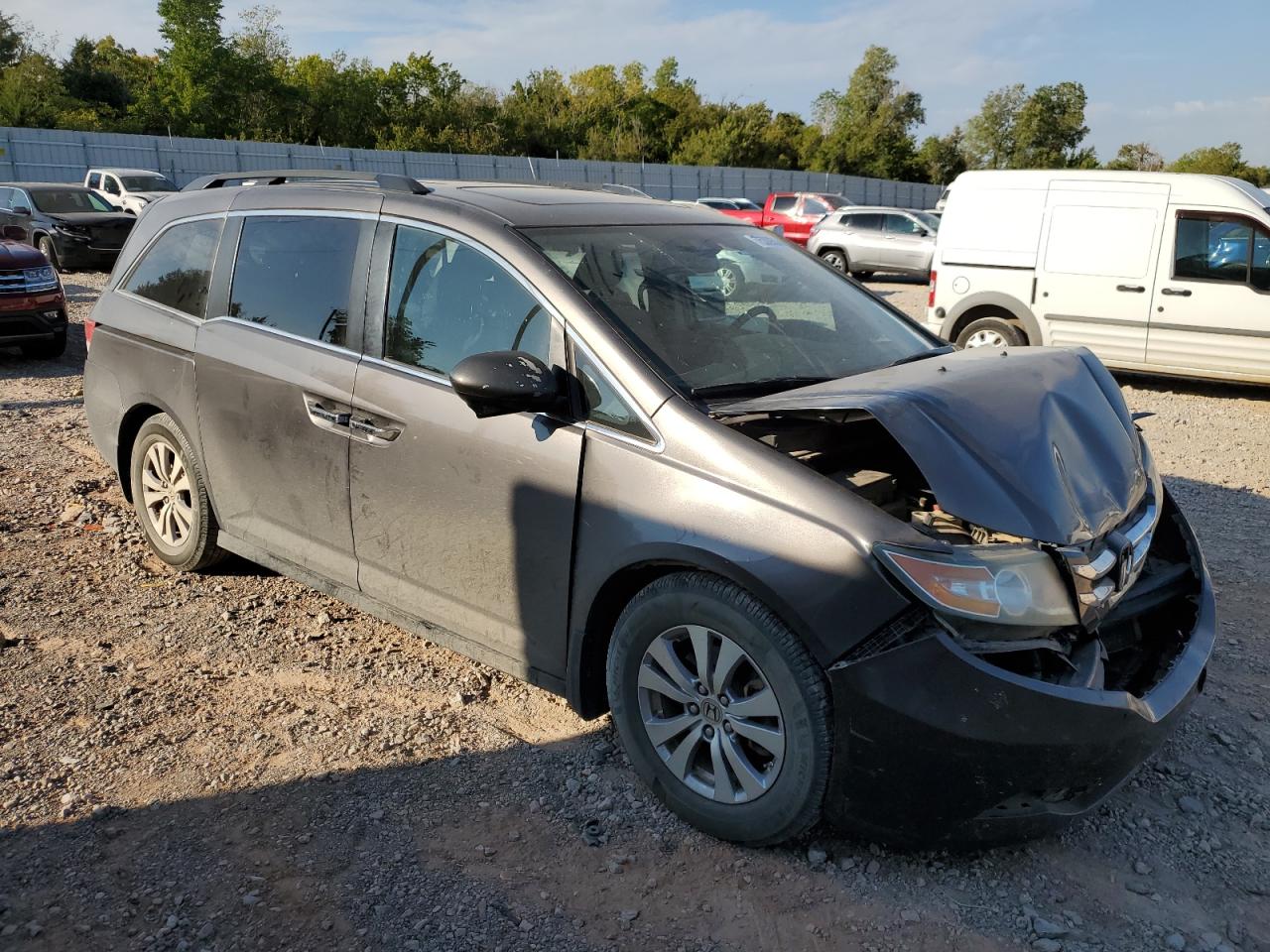 2014 Honda Odyssey VIN 5FNRL5H6XEB017711 Copart auction photo, front end / minor dent/scratches damage thumbnail 4