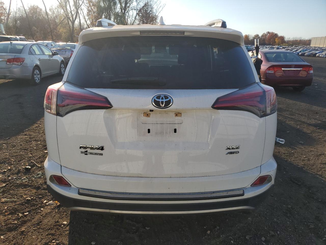 2018 Toyota RAV 4 VIN JTMRFREV3JJ185347 Copart auction photo, side / front end damage thumbnail 6