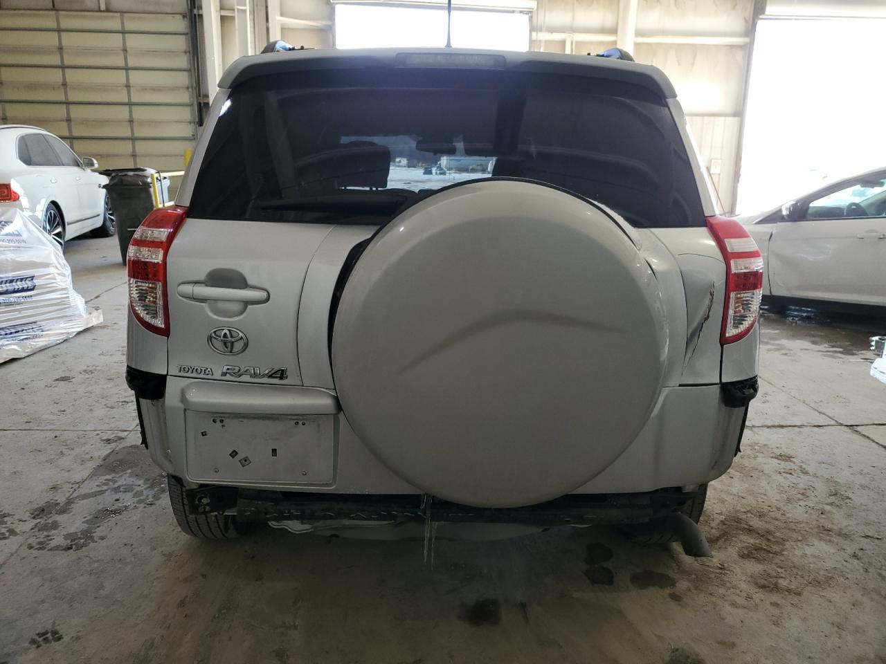 2009 Toyota RAV 4 VIN JTMZF33V79D010593 Copart auction photo, rear end damage thumbnail 6