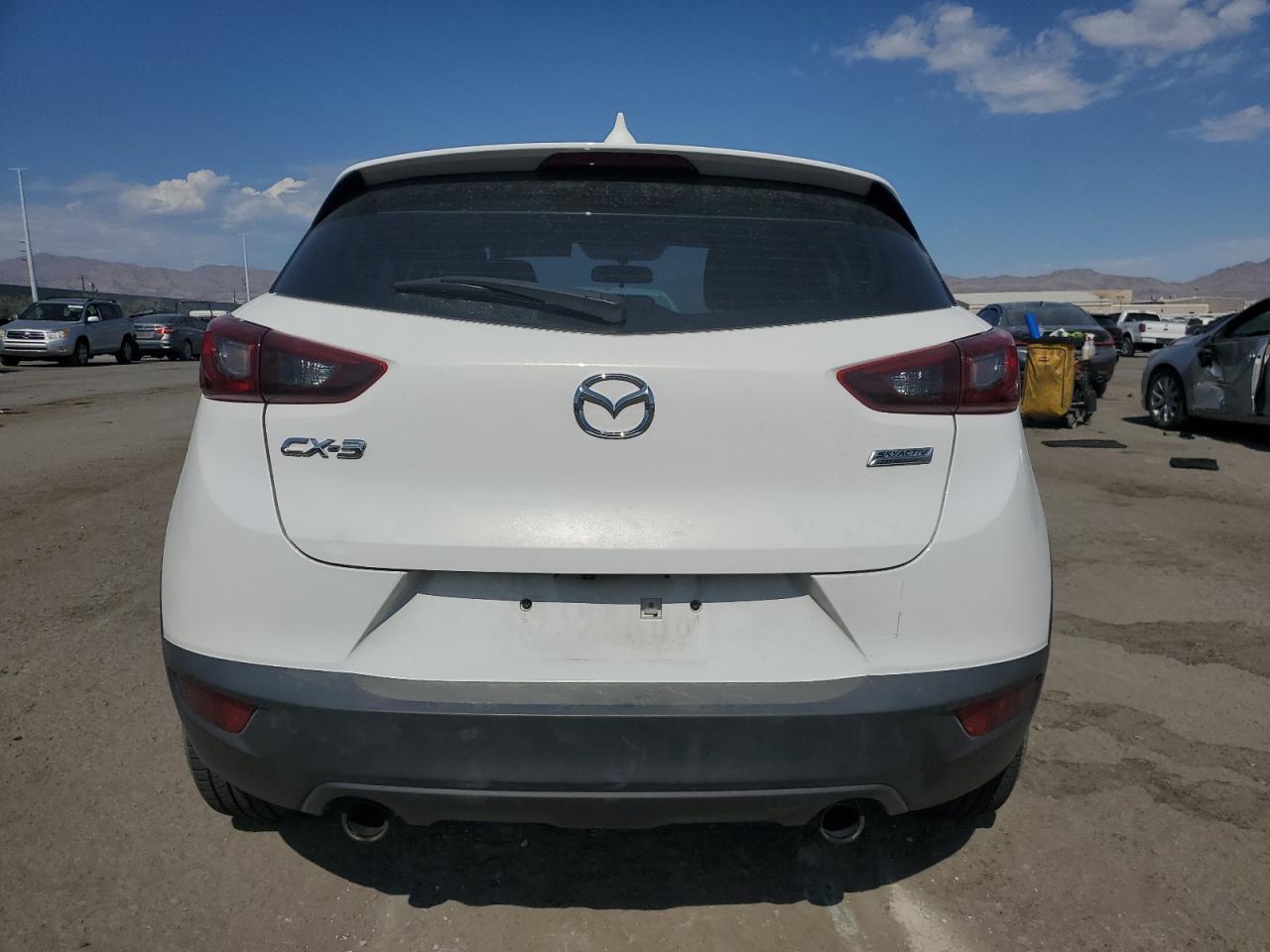 2017 Mazda CX-3 VIN JM1DKDB70H0165989 Copart auction photo, side damage thumbnail 6