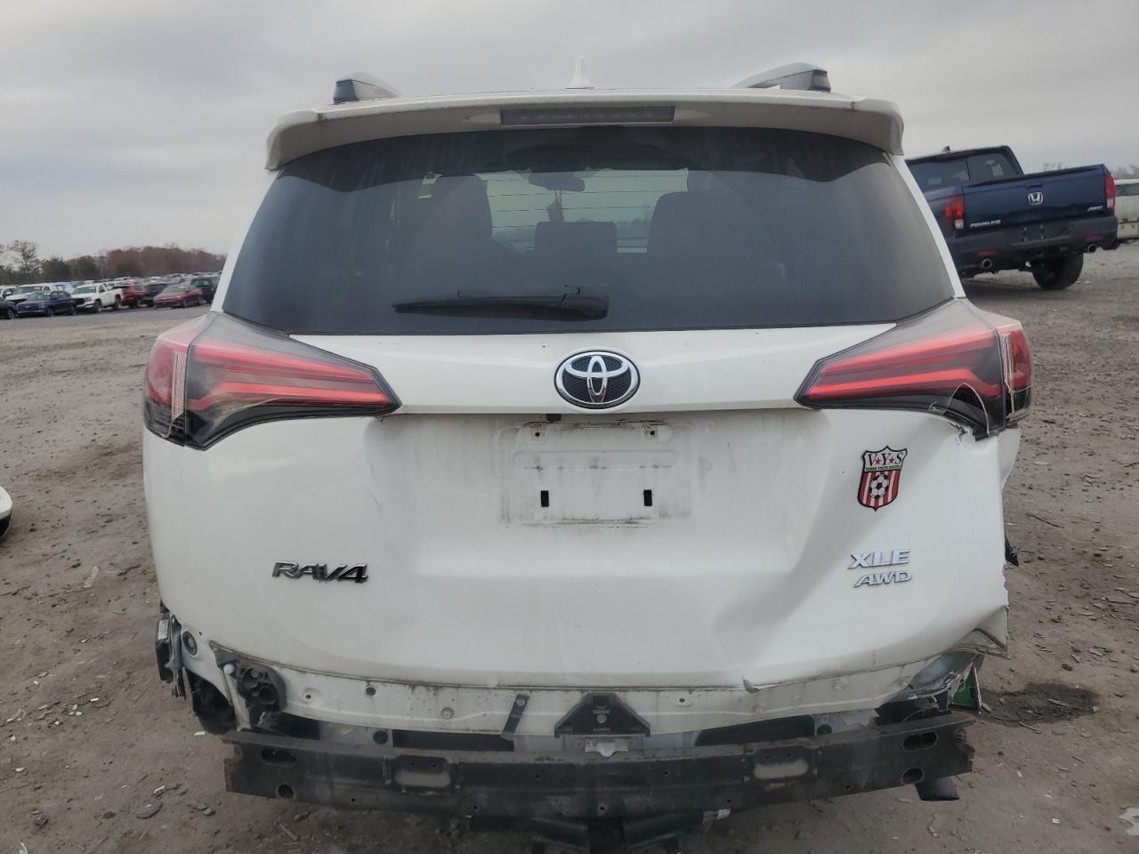 2018 Toyota RAV 4 VIN JTMRFREV3JD229488 Copart auction photo, rear end / side damage thumbnail 6