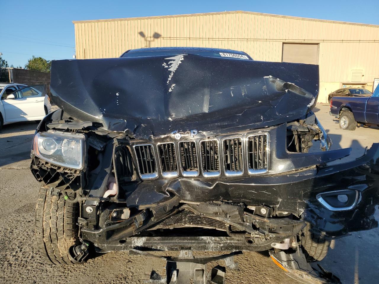 2015 Jeep Grand Cherokee VIN 1C4RJEBGXFC654426 Copart auction photo, front end damage thumbnail 5