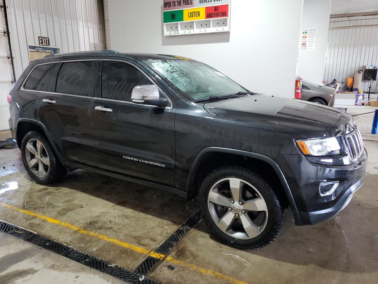 2015 Jeep Grand Cherokee VIN 1C4RJFBG1FC622440 Copart auction photo, side damage thumbnail 4