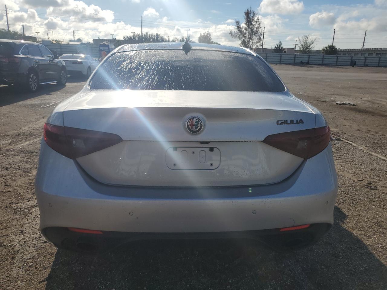 2019 Alfa Romeo Giulia VIN ZARFAMBN2K7621392 Copart auction photo, front end / side damage thumbnail 6