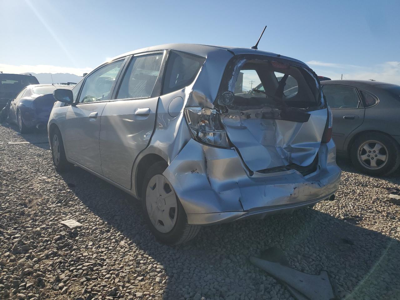 2012 Honda Fit VIN JHMGE8G31CC029961 Copart auction photo, front end / rear end damage thumbnail 2