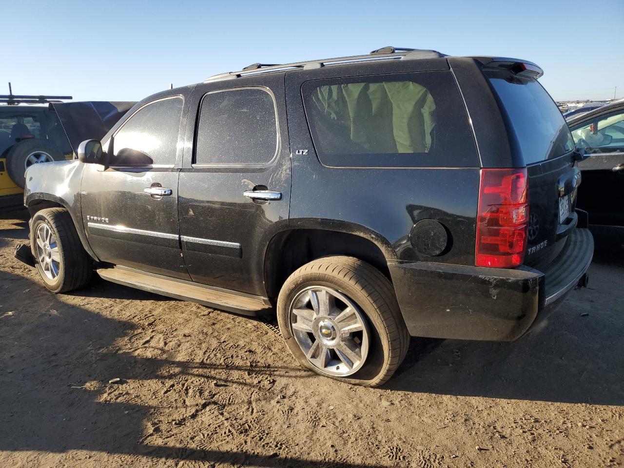 2009 Chevrolet Tahoe VIN 1GNFK33289R129834 Copart auction photo, front end / side damage thumbnail 2