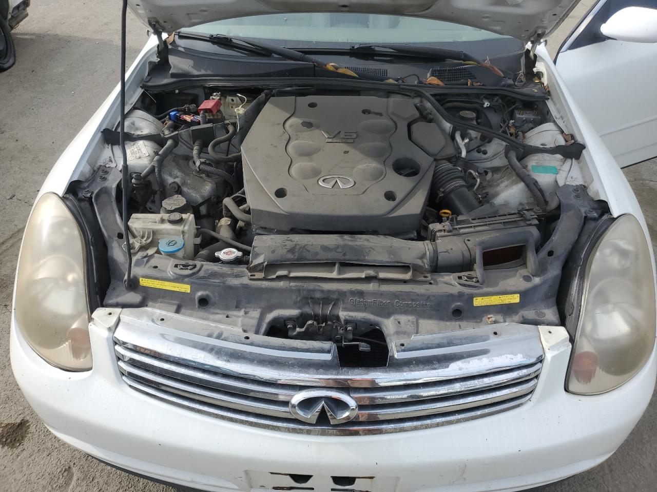 2004 Infiniti G VIN JNKCV51E34M601289 Copart auction photo, vandalism damage thumbnail 11
