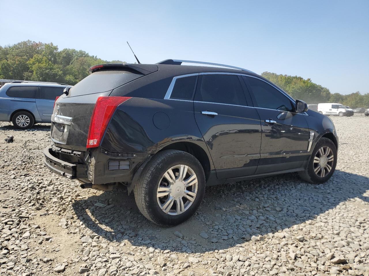 2011 Cadillac SRX VIN 3GYFNAEYXBS633692 Copart auction photo, rear end damage thumbnail 3