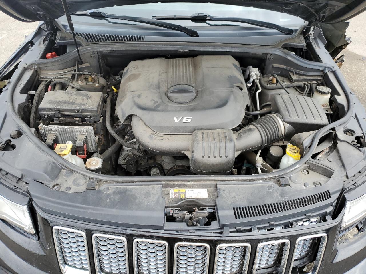 2015 Jeep Grand Cherokee VIN 1C4RJFJG0FC157778 Copart auction photo, front end / undercarriage damage thumbnail 12