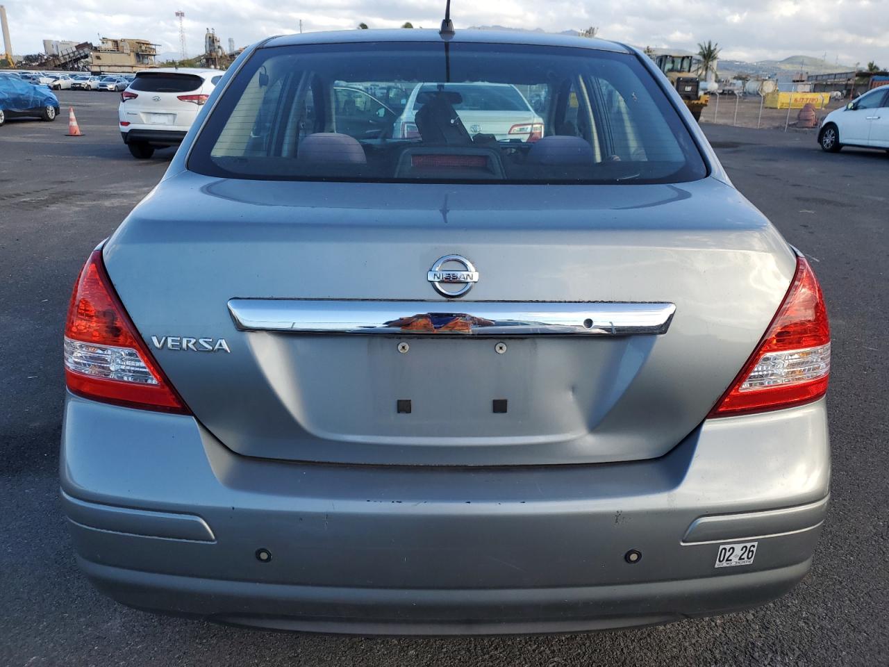 2009 Nissan Versa VIN 3N1BC11E49L491482 Copart auction photo, front end damage thumbnail 6
