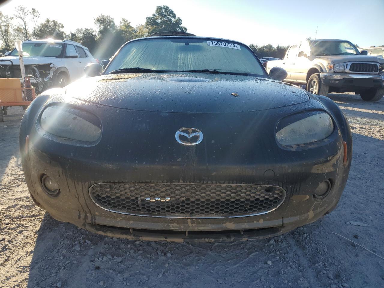 2007 Mazda MX-5 VIN JM1NC26F570129706 Copart auction photo, water/flood damage thumbnail 5