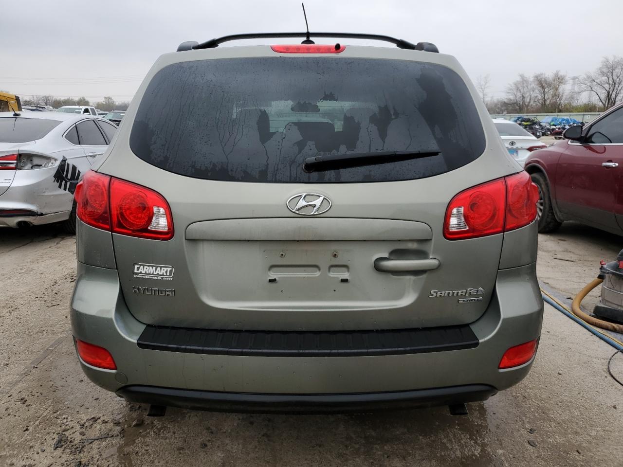2009 Hyundai Santa Fe VIN 5NMSG73D39H235520 Copart auction photo, front end / minor dent/scratches damage thumbnail 6