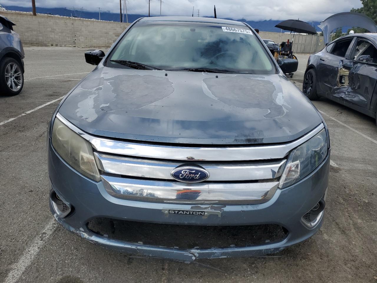 2011 Ford Fusion VIN 3FAHP0JA3BR275831 Copart auction photo, front end damage thumbnail 5