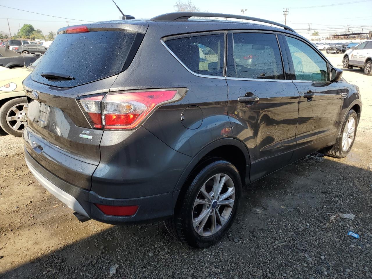 2017 Ford Escape VIN 1FMCU0GD5HUD54011 Copart auction photo, side damage thumbnail 3
