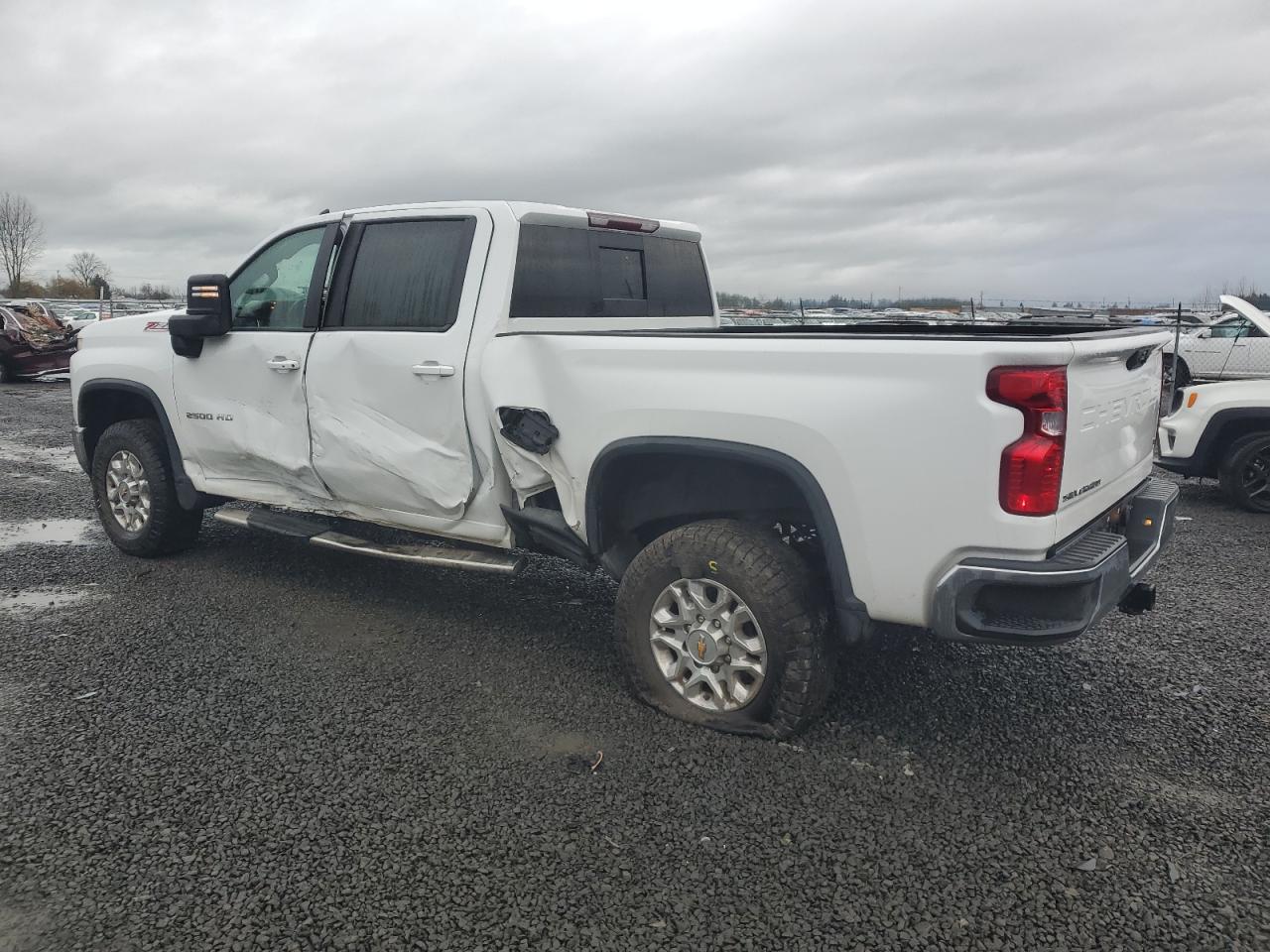 2023 Chevrolet Silverado VIN 1GC1YNEY2PF185281 Copart auction photo, side / rear end damage thumbnail 2