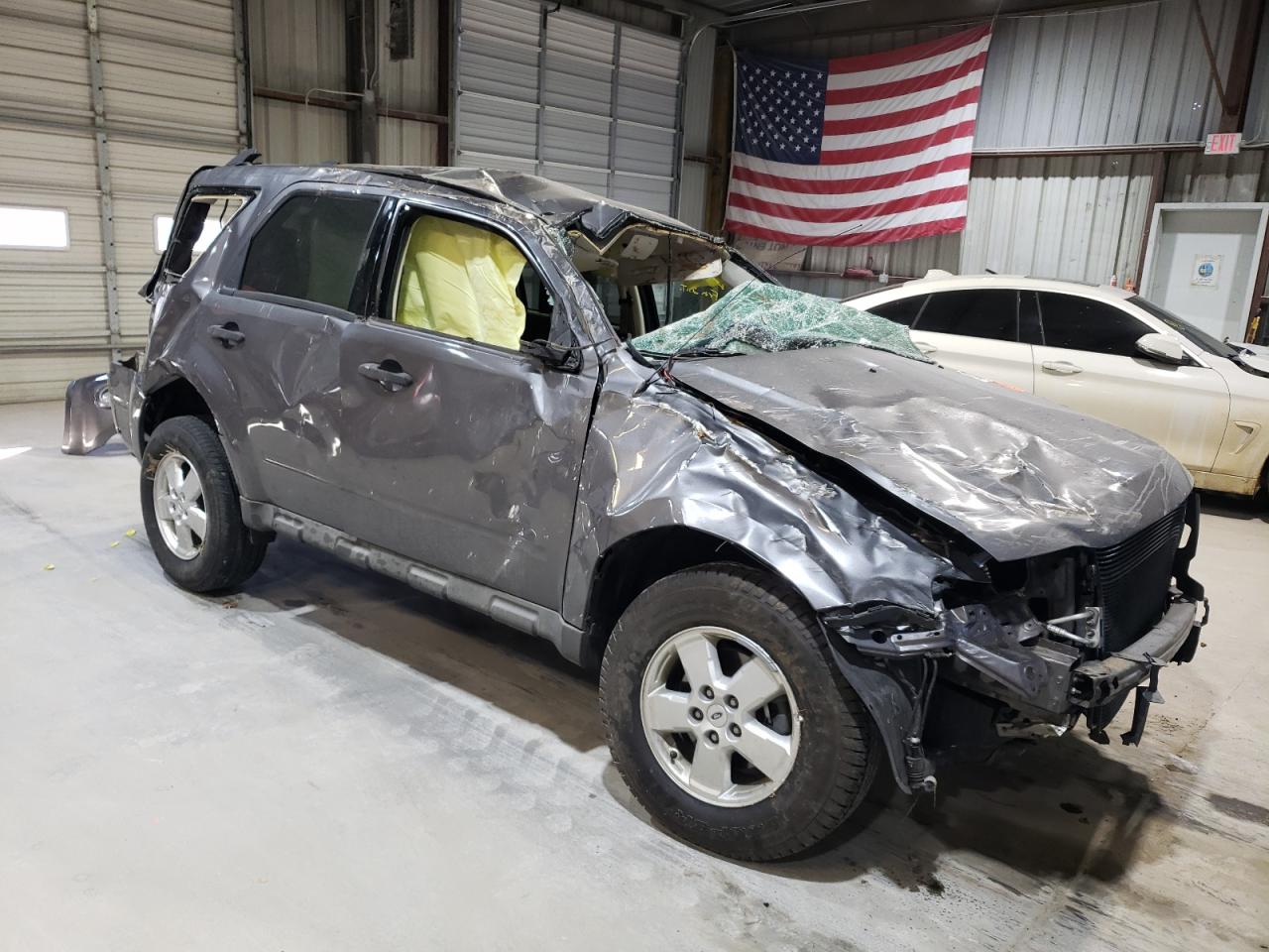 2009 Ford Escape VIN 1FMCU03GX9KC21063 Copart auction photo, rollover damage thumbnail 4