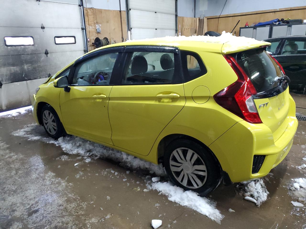 2016 Honda Fit VIN JHMGK5H56GX035597 Copart auction photo, front end / minor dent/scratches damage thumbnail 2