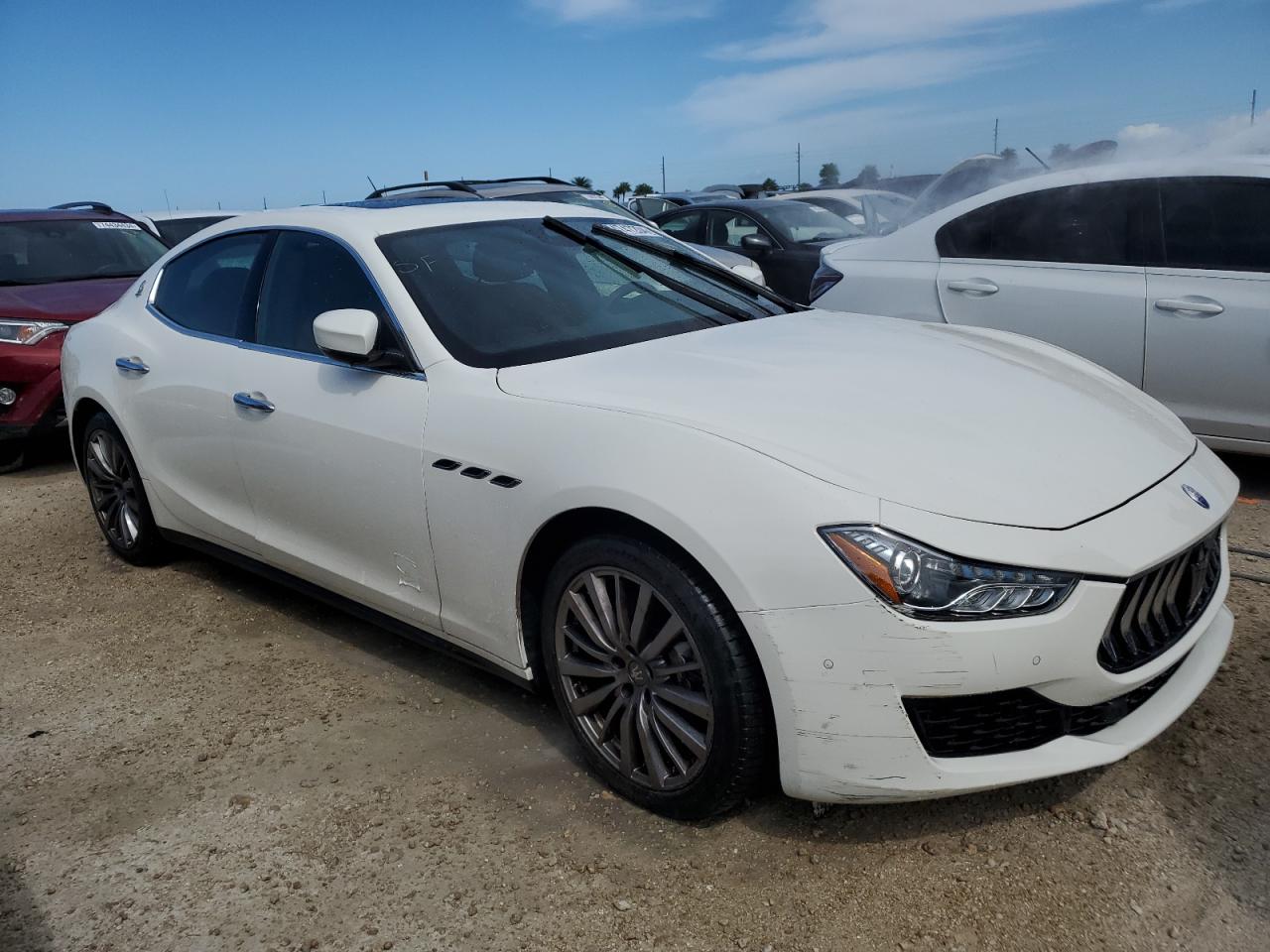 2019 Maserati Ghibli VIN ZAM57YTA3K1336495 Copart auction photo, water/flood damage thumbnail 4