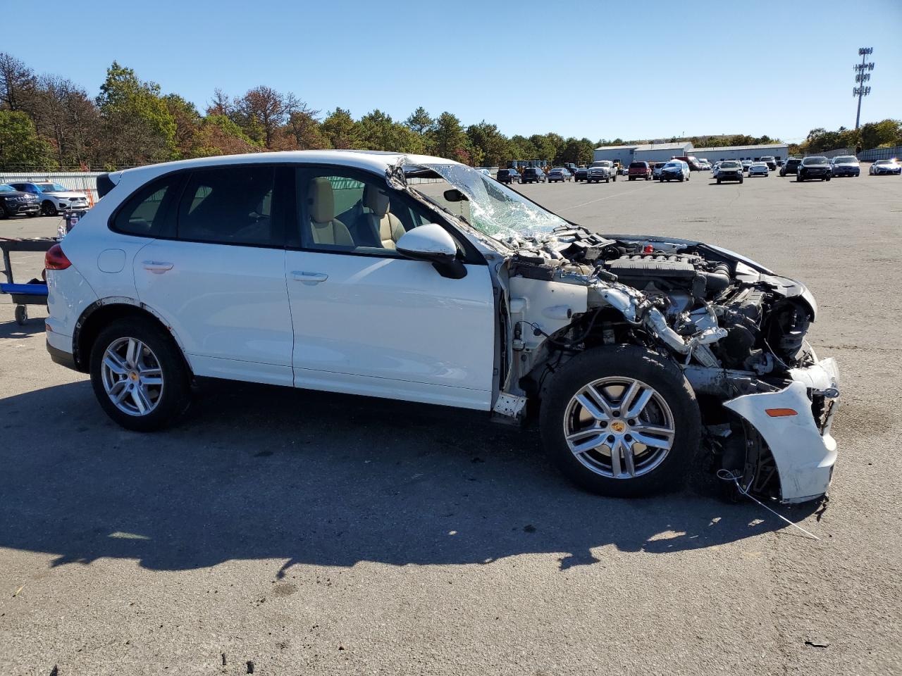 2016 Porsche Cayenne VIN WP1AA2A24GLA10468 Copart auction photo, front end / side damage thumbnail 4
