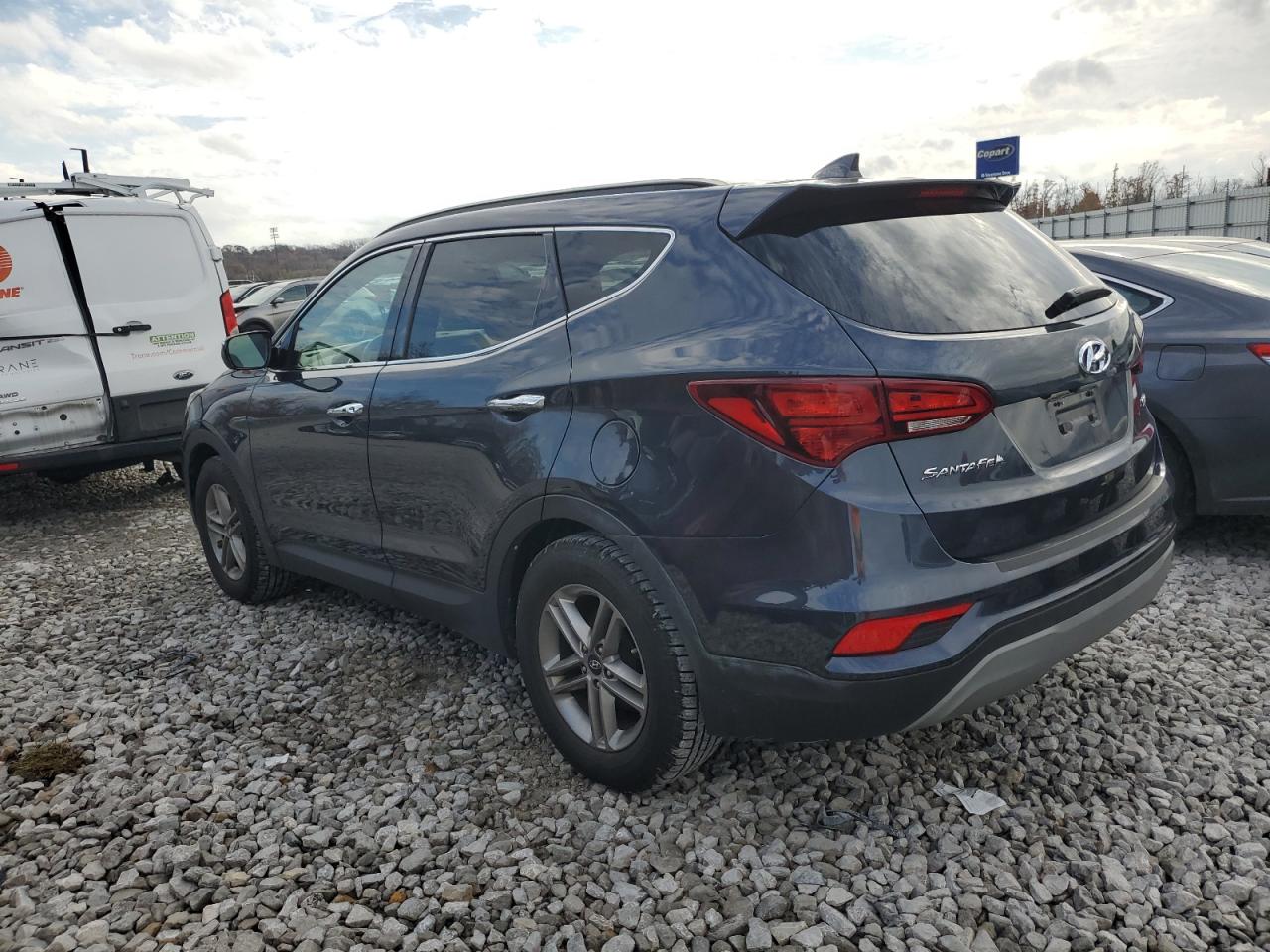 2018 Hyundai Santa Fe VIN 5NMZU3LB6JH083610 Copart auction photo, hail damage thumbnail 2