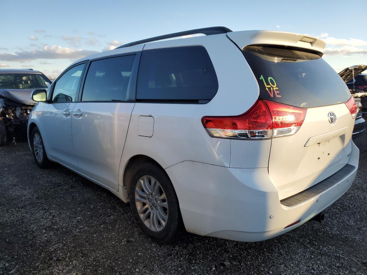 2014 Toyota Sienna VIN 5TDYK3DC6ES412947 Copart auction photo, side damage thumbnail 2