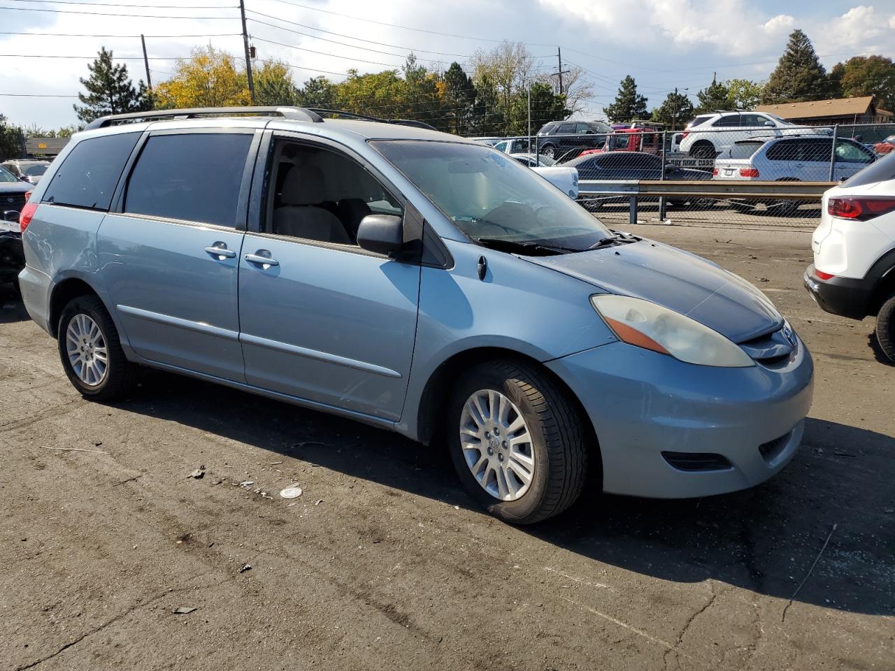 2009 Toyota Sienna VIN 5TDBK23C79S028148 Copart auction photo, side damage thumbnail 4